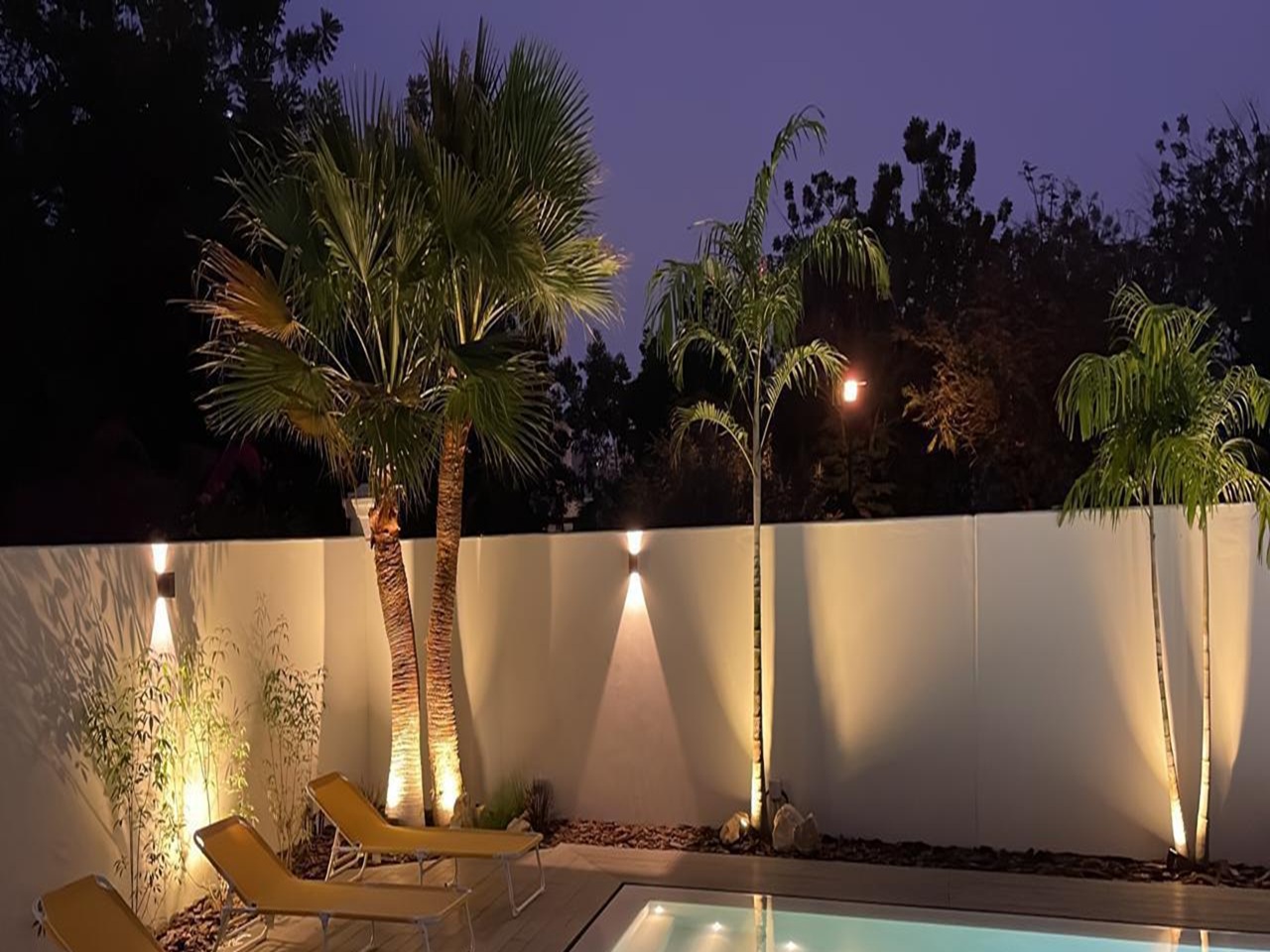Modern luxury swimming pool night view in Dubai